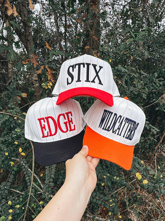 Premium pinstripe team hats with custom puff embroidery. Perfect for baseball teams, softball teams, spirit wear, coaches, and fans.