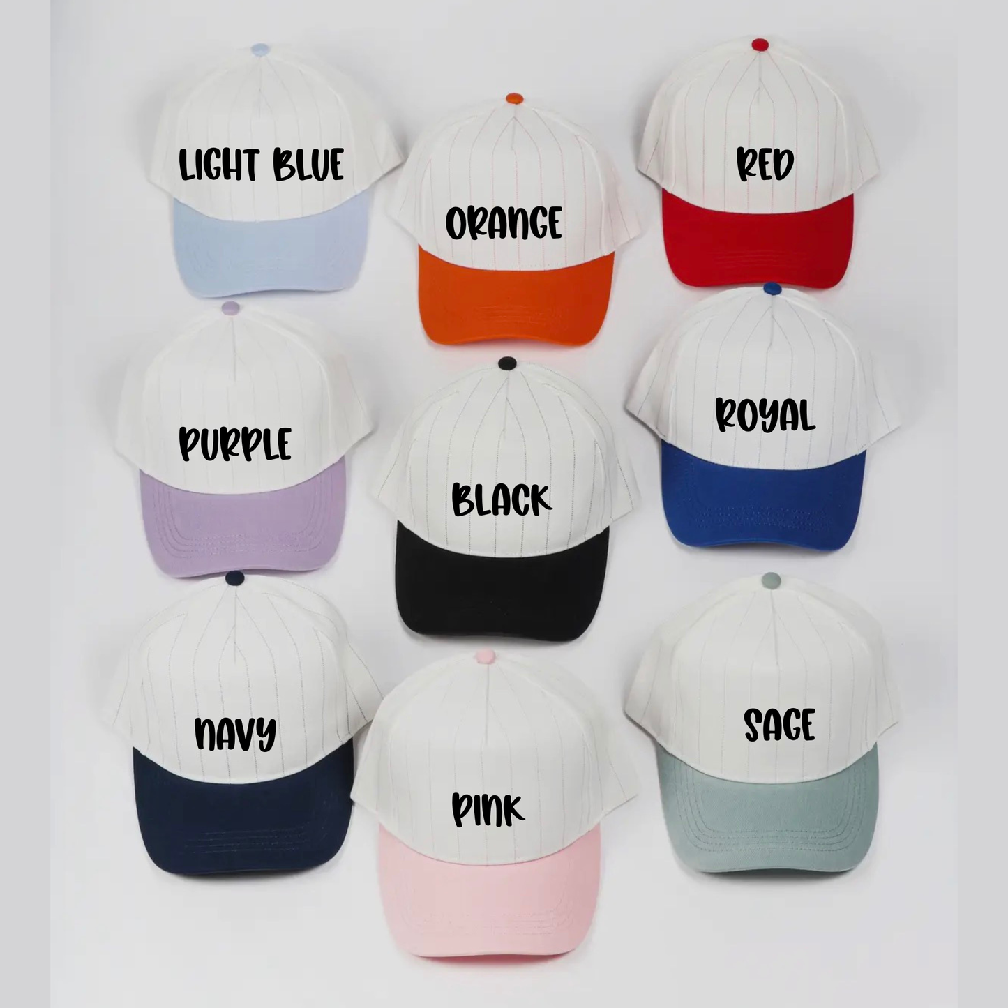Collection of baseball caps with color labels on a white background