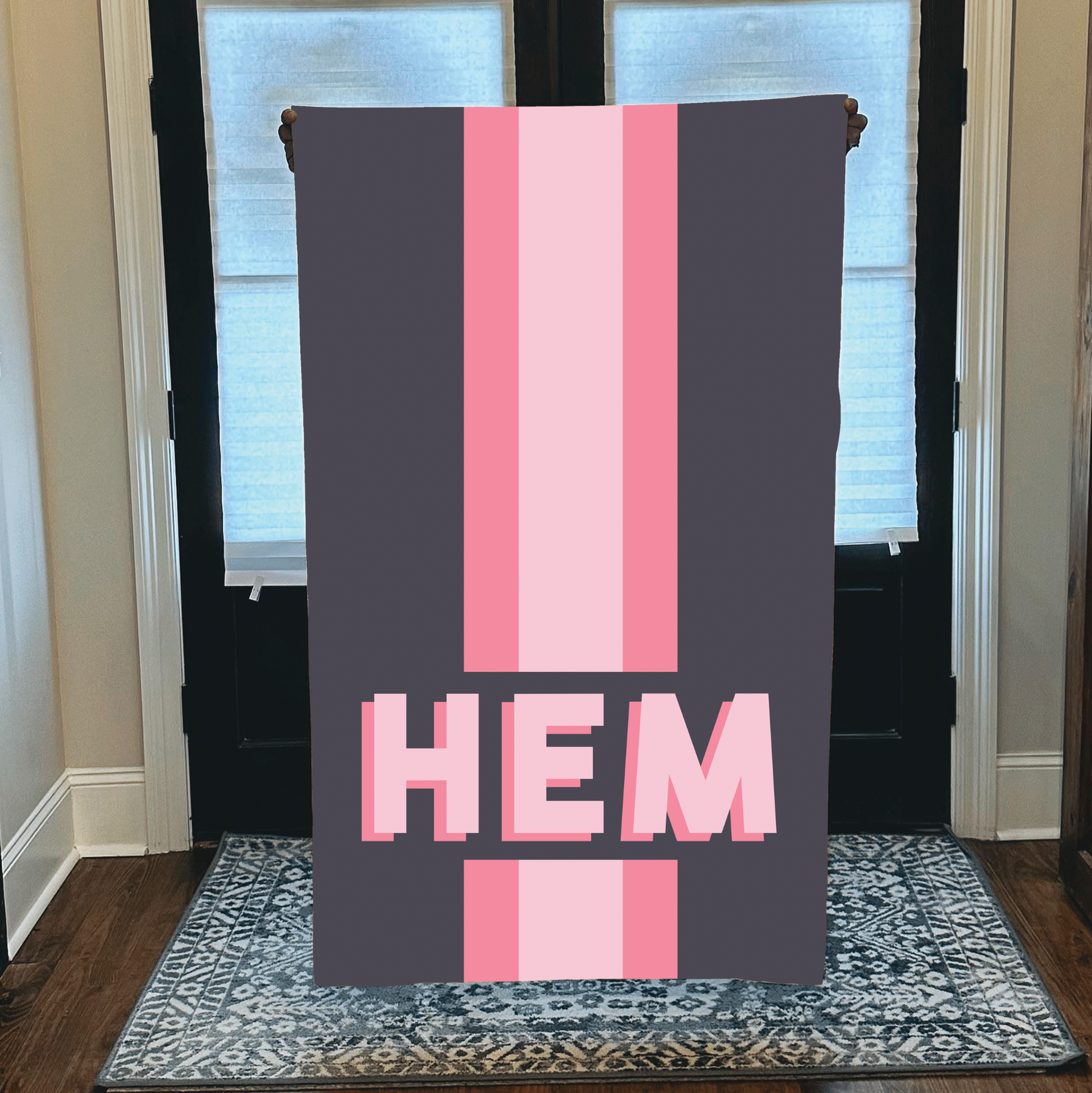 Personalized beach towel with custom monogram and pink and grey striped pastel design