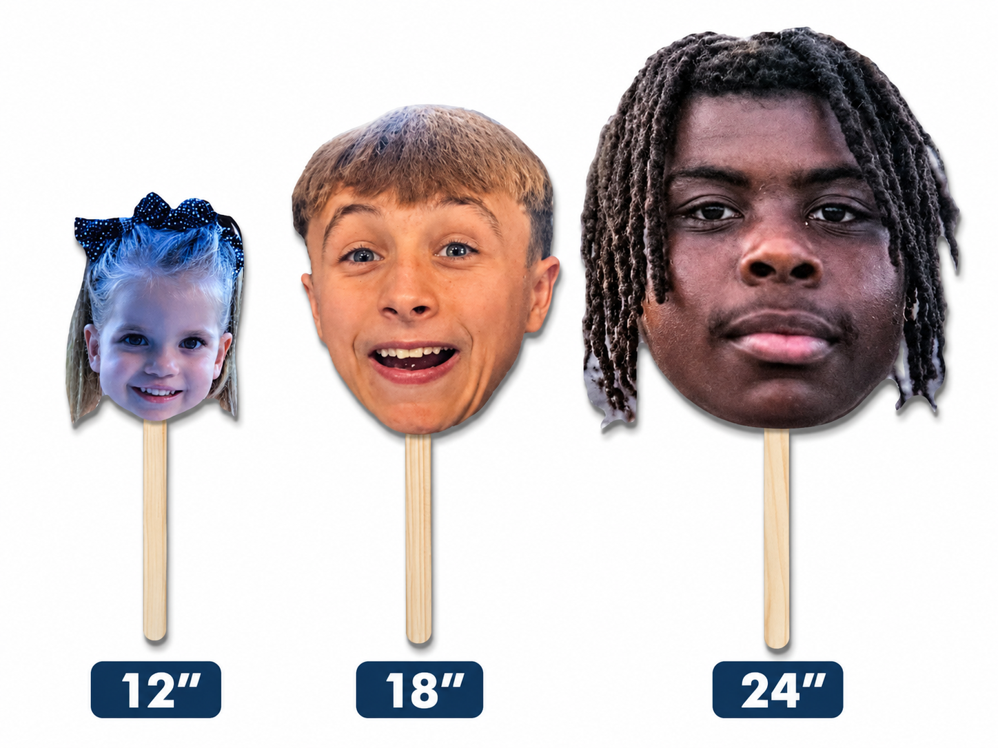 Three face masks on sticks with different heights labeled 12 - 18- 24